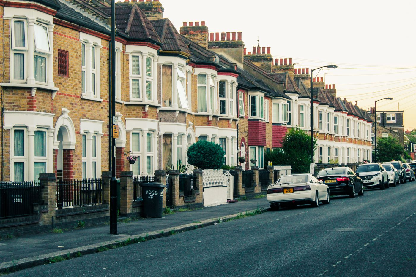 A street of brick terraced houses in east London